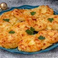 Шницель куриный с ананасами под сыром